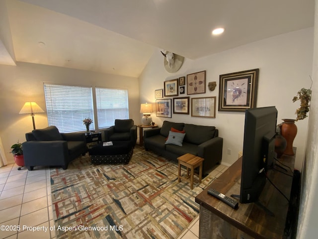 758 Pine Ct, New Castle, CO 81647 - tiled living room featuring vaulted ceiling, baseboards, and recessed lighting