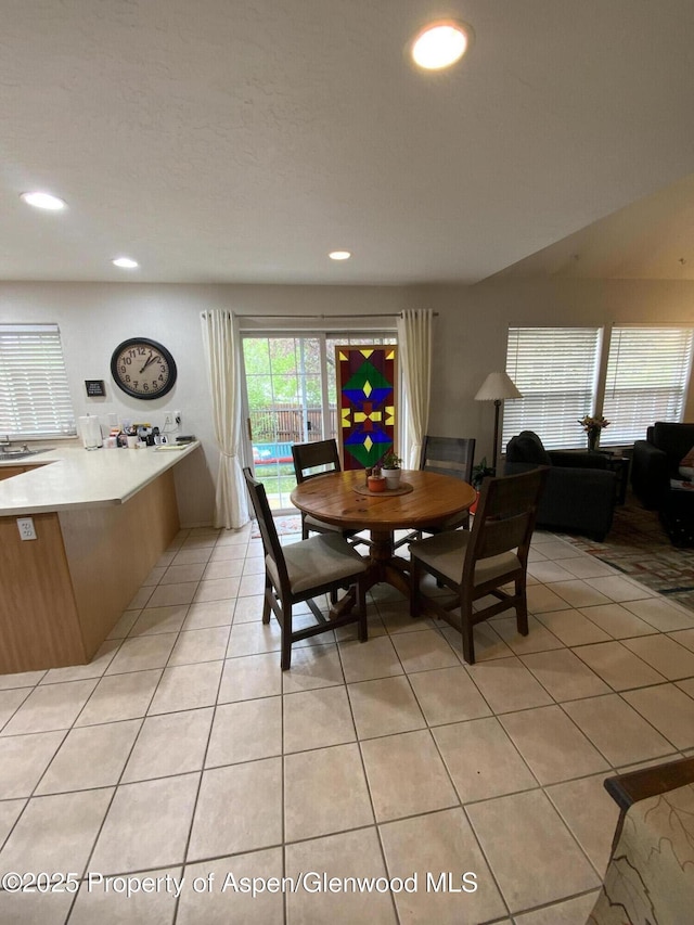 758 Pine Ct, New Castle, CO 81647 - dining room featuring light tile patterned floors and recessed lighting