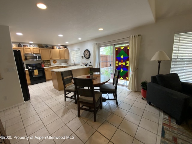 758 Pine Ct, New Castle, CO 81647 - dining area with light tile patterned floors and recessed lighting