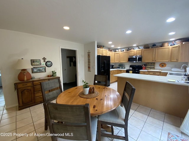 758 Pine Ct, New Castle, CO 81647 - dining space with light tile patterned floors and recessed lighting