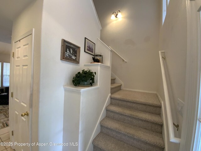758 Pine Ct, New Castle, CO 81647 - staircase featuring baseboards