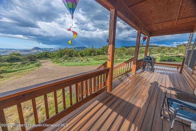 1349 Eagle Loop, Craig, CO 81625 - wooden deck featuring area for grilling and a mountain view