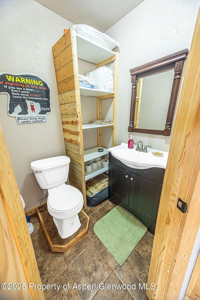 1349 Eagle Loop, Craig, CO 81625 - bathroom with toilet and vanity