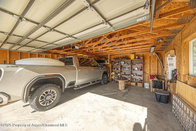 1349 Eagle Loop, Craig, CO 81625 - garage with wooden walls and a garage door opener
