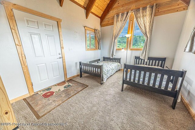 1349 Eagle Loop, Craig, CO 81625 - bedroom featuring wood ceiling with exposed beams, carpet flooring, baseboards, and high vaulted ceiling