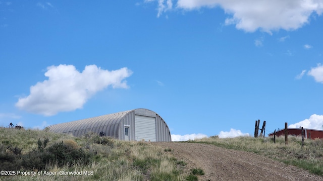 3294 County Road 103, Craig, CO 81625 - view of outdoor structure with an outdoor structure and dirt driveway