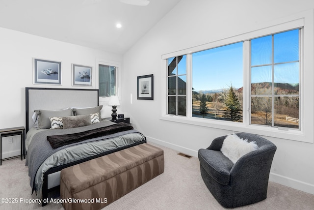 bedroom featuring carpet flooring, visible vents, baseboards, and lofted ceiling