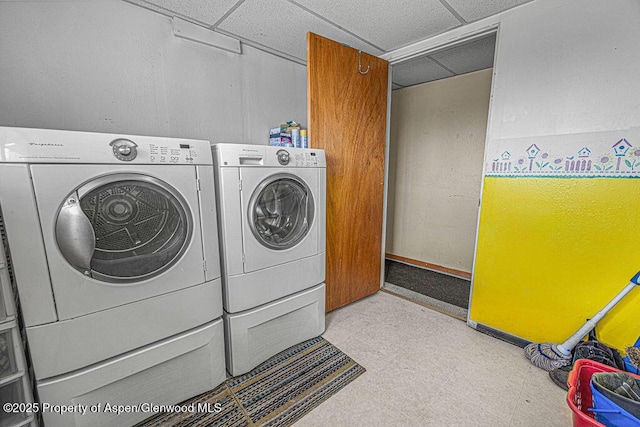 1097 Kowach Dr, Craig, CO 81625 - washroom featuring independent washer and dryer and tile patterned floors