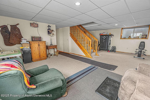 1097 Kowach Dr, Craig, CO 81625 - living room with stairway, baseboards, a paneled ceiling, and recessed lighting