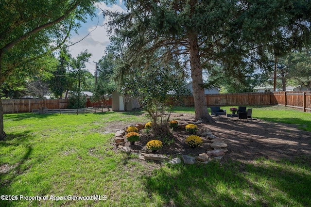 750 Breeze St, Craig, CO 81625 - fenced backyard with a storage shed