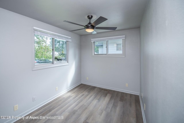 750 Breeze St, Craig, CO 81625 - spare room with wood finished floors and a ceiling fan