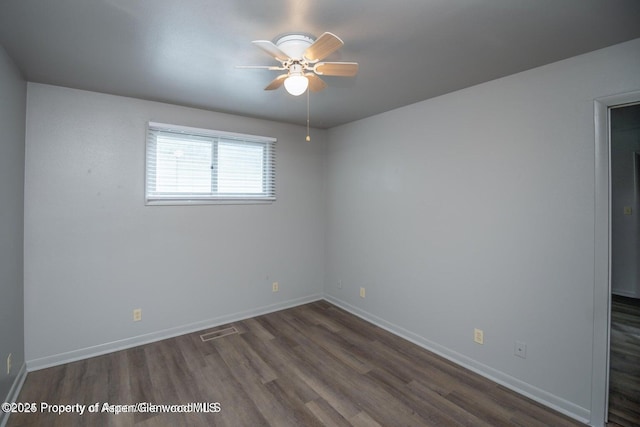 750 Breeze St, Craig, CO 81625 - empty room featuring ceiling fan and wood finished floors