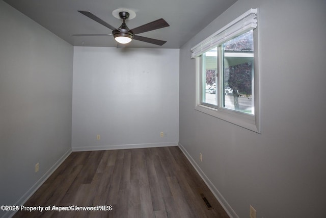 750 Breeze St, Craig, CO 81625 - empty room with wood finished floors and a ceiling fan