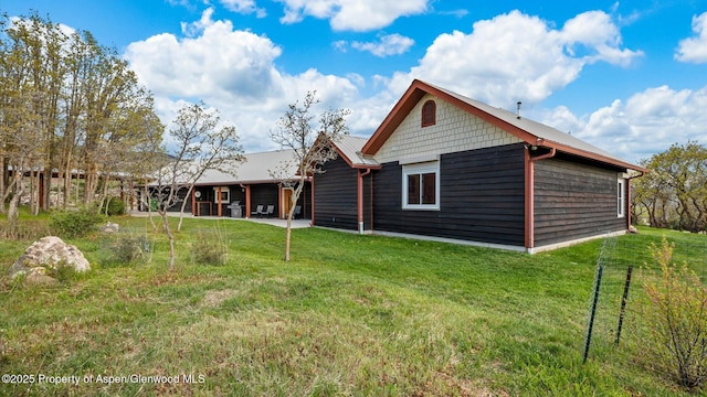 220 Sam Grange Ct, Eljebel, CO 81623 - back of house with a yard