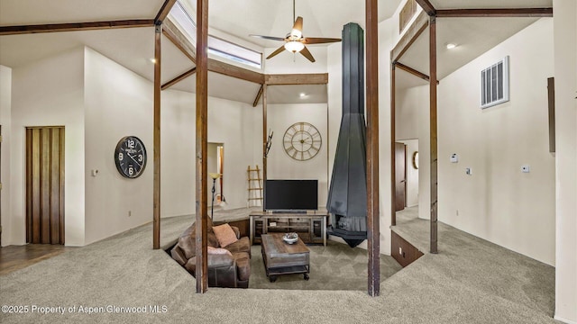 541 20 1/2 Rd, Grand Junction, CO 81507 - living area with high vaulted ceiling, carpet, a ceiling fan, and a skylight