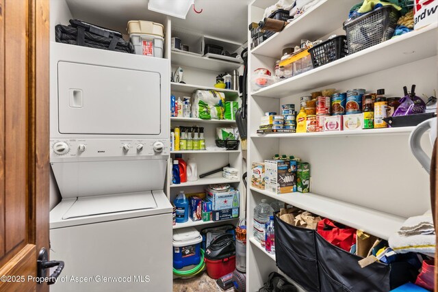 926 Waters Ave # 203, Aspen, CO 81611 - washroom featuring stacked washer / dryer