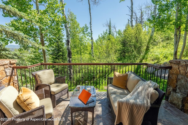 exterior space featuring an outdoor hangout area