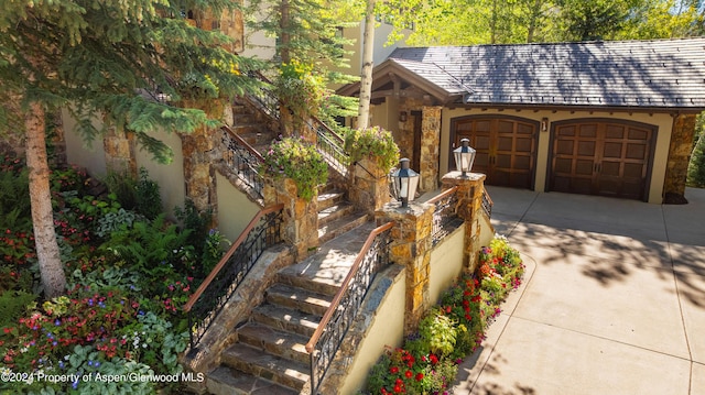 view of property exterior with a garage