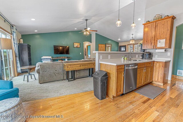 352 Lake View Rd, Hayden, CO 81639 - kitchen with stainless steel dishwasher, a sink, open floor plan, plenty of natural light, and lofted ceiling