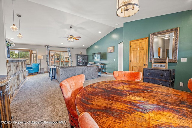 352 Lake View Rd, Hayden, CO 81639 - carpeted dining area with vaulted ceiling, a ceiling fan, a chandelier, and recessed lighting