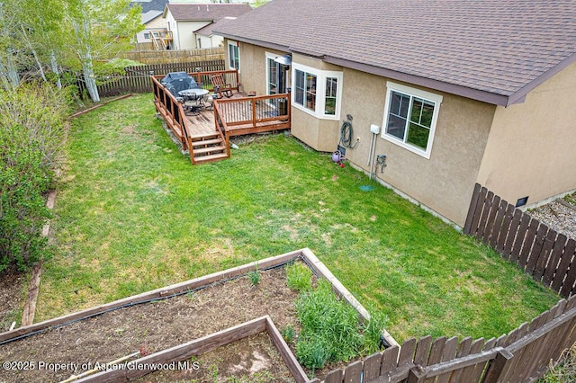 352 Lake View Rd, Hayden, CO 81639 - view of yard featuring a deck and a garden