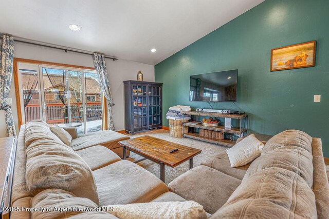 352 Lake View Rd, Hayden, CO 81639 - living room featuring vaulted ceiling, recessed lighting, and baseboards