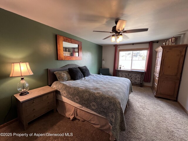 352 Lake View Rd, Hayden, CO 81639 - carpeted bedroom featuring ceiling fan