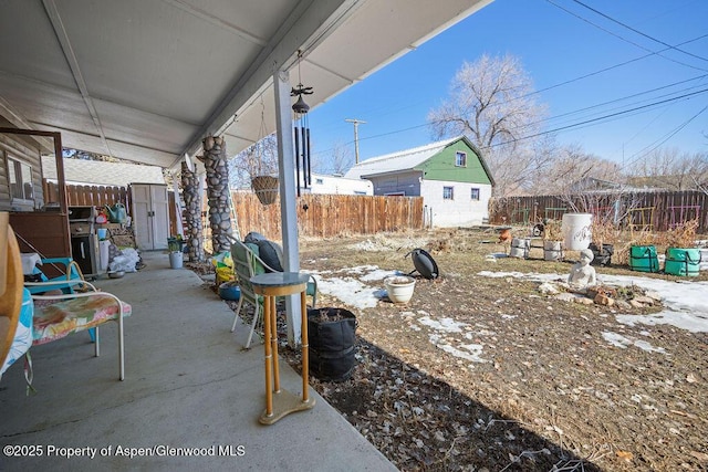 view of patio with a fenced backyard