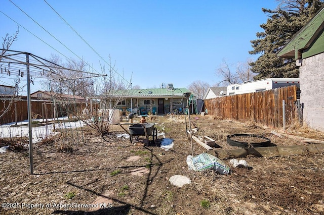 view of yard with a patio area and a fenced backyard