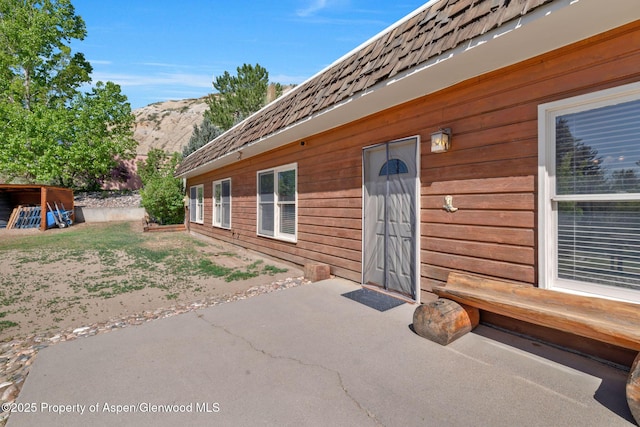 565 Sandrock Dr, Craig, CO 81625 - entrance to property with a patio and a mountain view