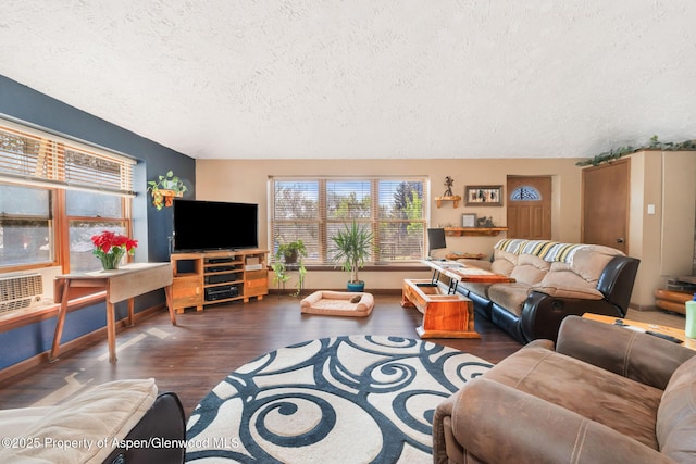 565 Sandrock Dr, Craig, CO 81625 - living area with a textured ceiling, wood finished floors, and baseboards