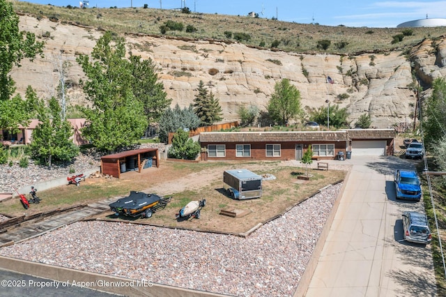 565 Sandrock Dr, Craig, CO 81625 - view of front of property featuring driveway and a garage