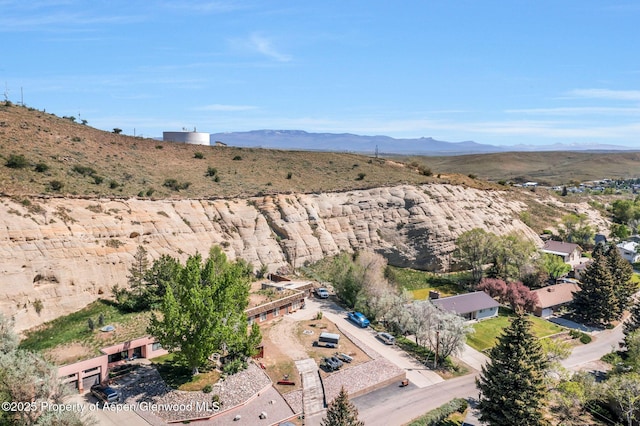 565 Sandrock Dr, Craig, CO 81625 - drone / aerial view of a mountainous background