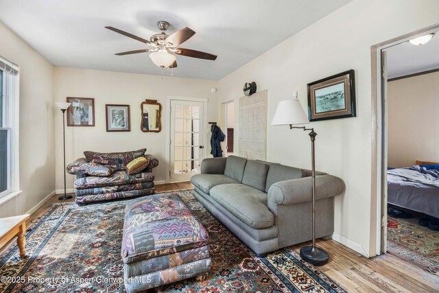 824 Lincoln Ave, Glenwood Springs, CO 81601 - living area featuring ceiling fan, baseboards, and wood finished floors