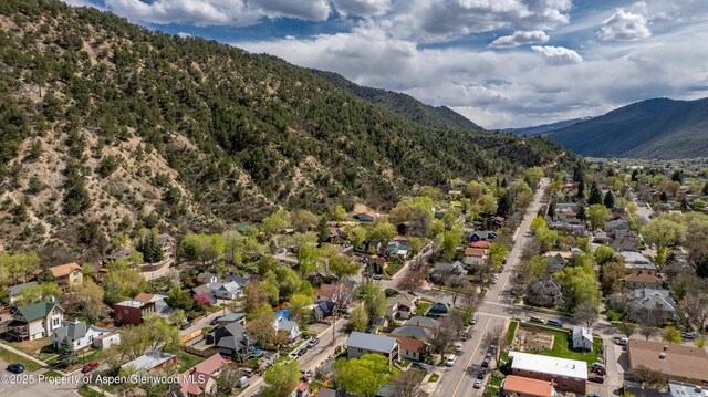 824 Lincoln Ave, Glenwood Springs, CO 81601 - drone / aerial view featuring a residential view and a mountain view