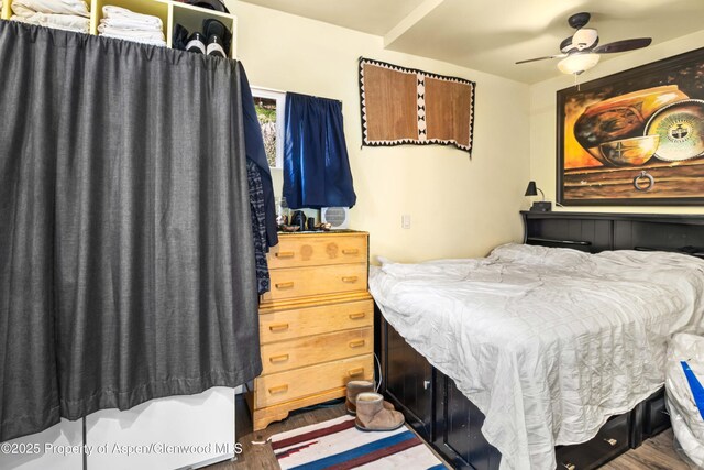 824 Lincoln Ave, Glenwood Springs, CO 81601 - bedroom with a ceiling fan and wood finished floors