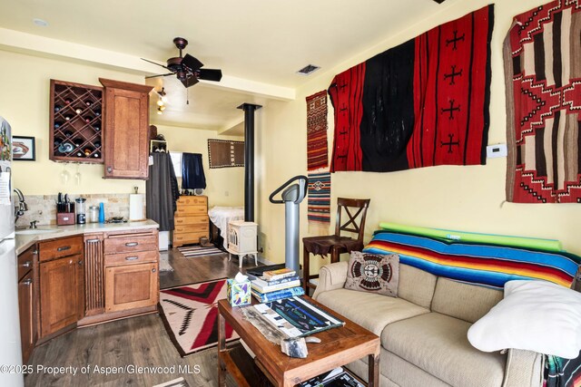 824 Lincoln Ave, Glenwood Springs, CO 81601 - living room with visible vents, dark wood-type flooring, and ceiling fan