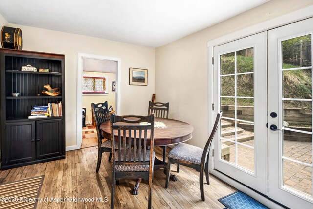 824 Lincoln Ave, Glenwood Springs, CO 81601 - dining room with light wood-type flooring and french doors