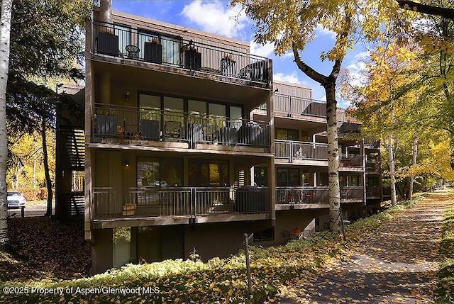 800 E Hopkins Ave Unit A-1, Aspen, CO 81611 - rear view of house featuring a balcony