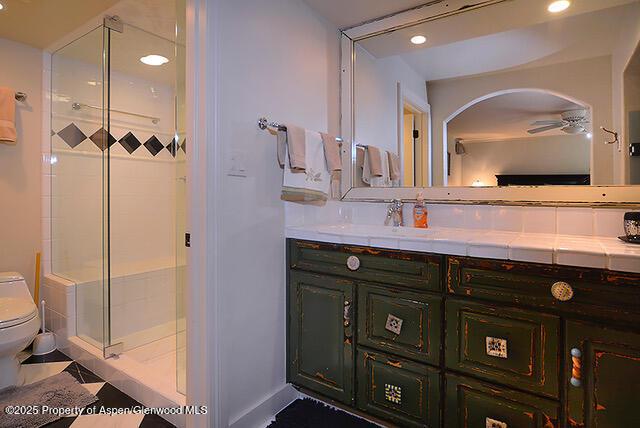 800 E Hopkins Ave Unit A-1, Aspen, CO 81611 - full bath with a stall shower, vanity, a ceiling fan, and recessed lighting