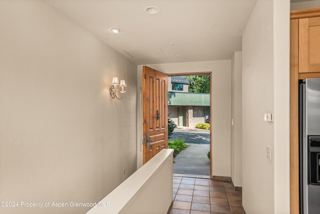 interior space featuring light tile patterned flooring