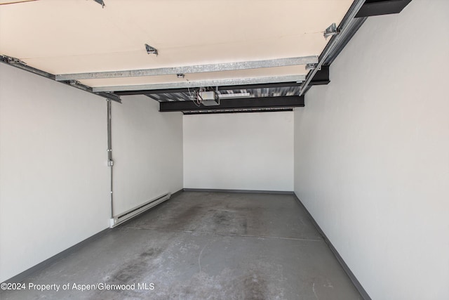 garage with a baseboard heating unit