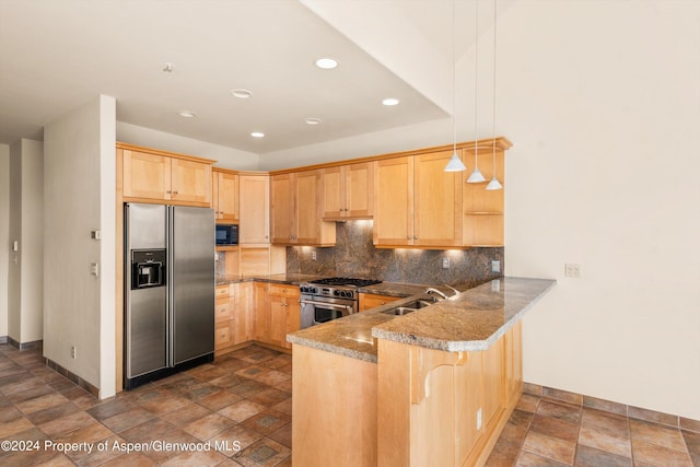 kitchen featuring light brown cabinets, sink, tasteful backsplash, decorative light fixtures, and stainless steel appliances