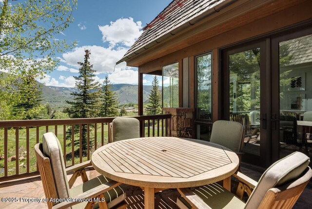 74 Pfister Dr Unit 101, Aspen, CO 81611 - wooden deck featuring a mountain view