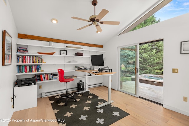 home office featuring a baseboard radiator, wood finished floors, ceiling fan, and vaulted ceiling