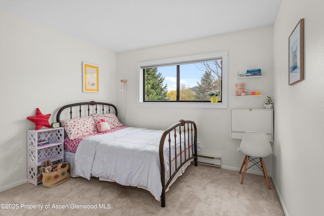 bedroom with carpet flooring, baseboard heating, and baseboards