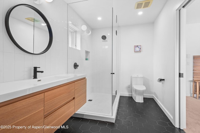 bathroom featuring tile patterned floors, visible vents, a stall shower, and toilet
