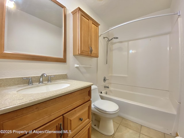 full bathroom with tile patterned floors, shower / bathing tub combination, vanity, and toilet