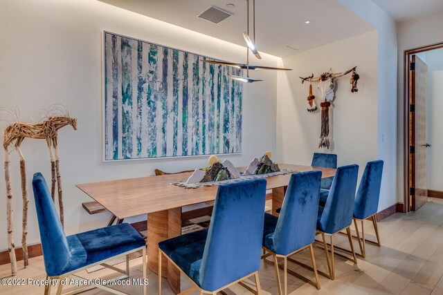 dining room featuring light hardwood / wood-style floors