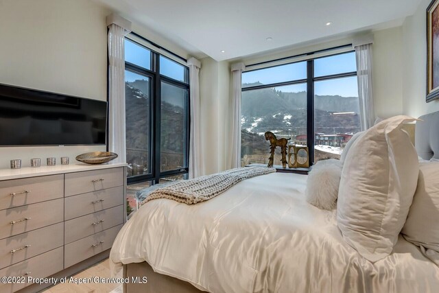 bedroom with a mountain view